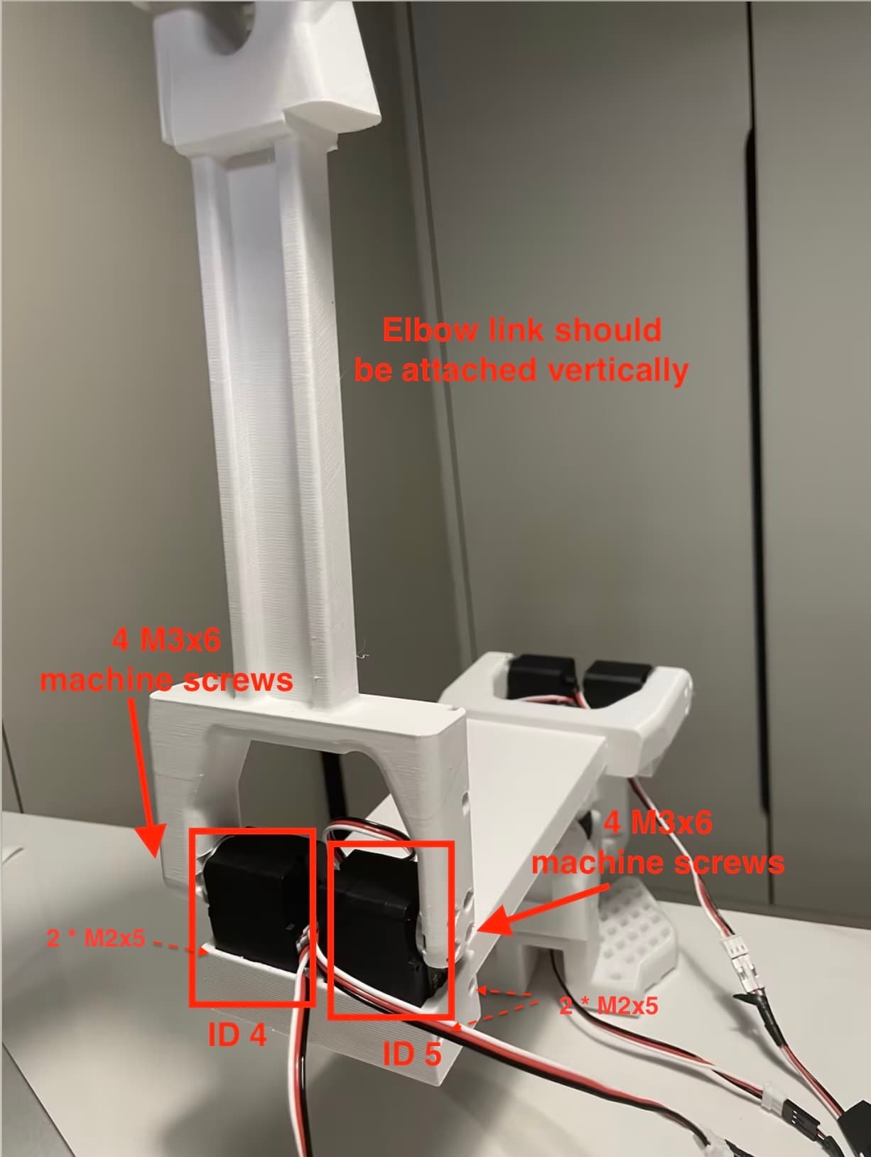 Insert servos and attach link